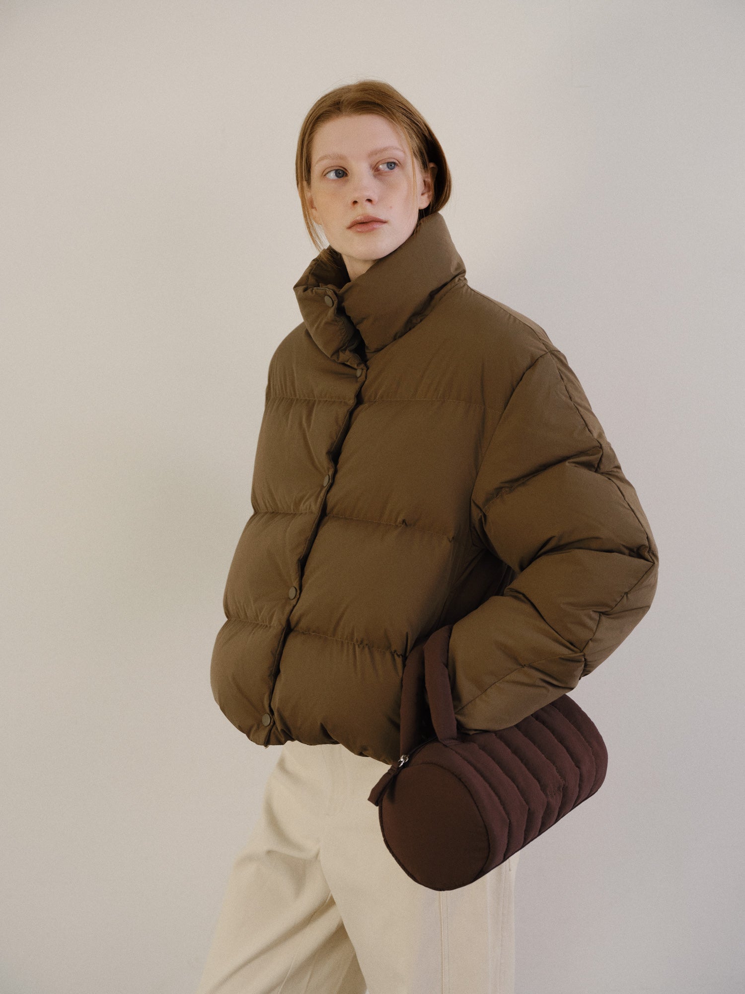 Cylinder padding tote bag