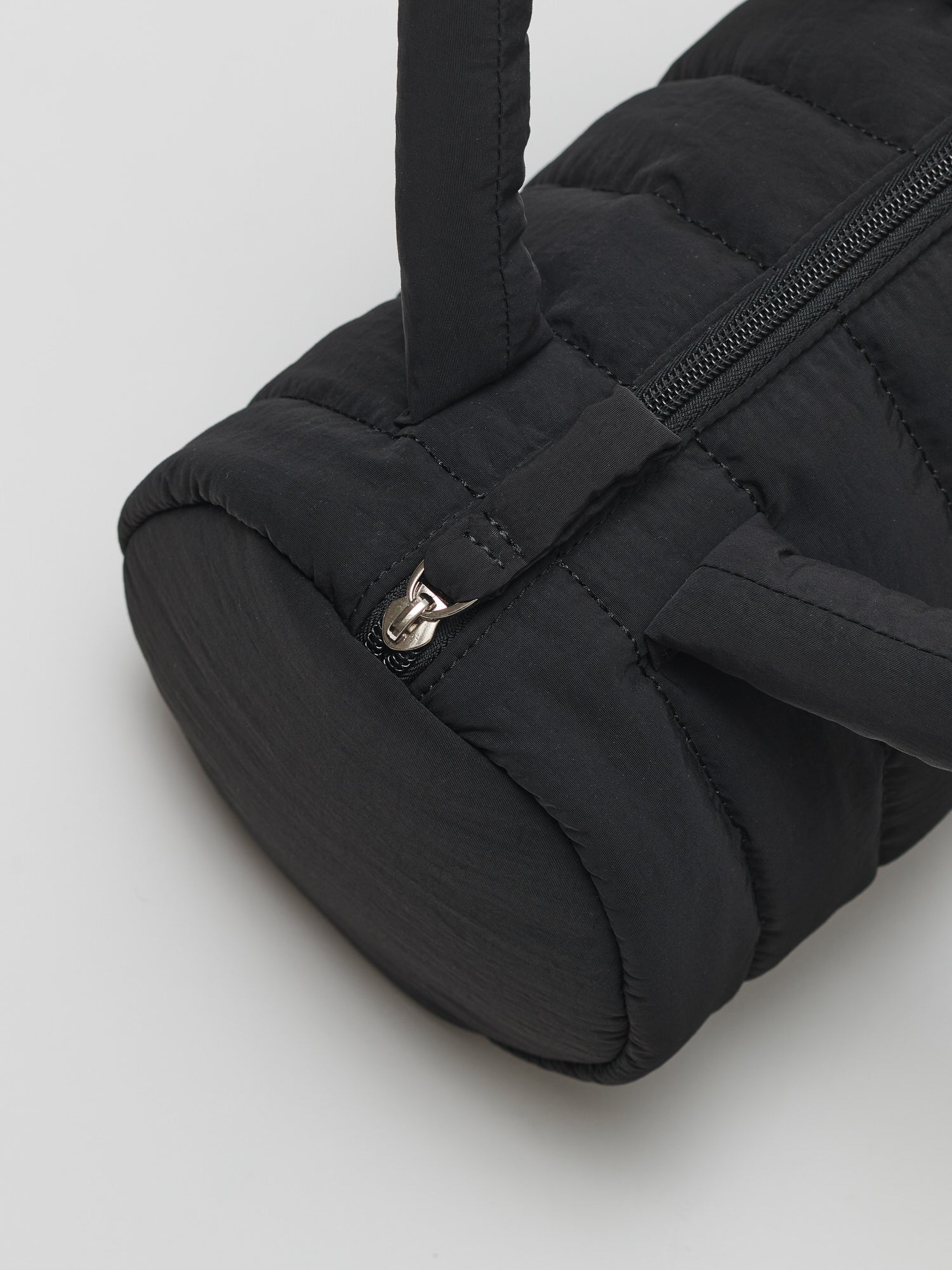 Cylinder padding tote bag