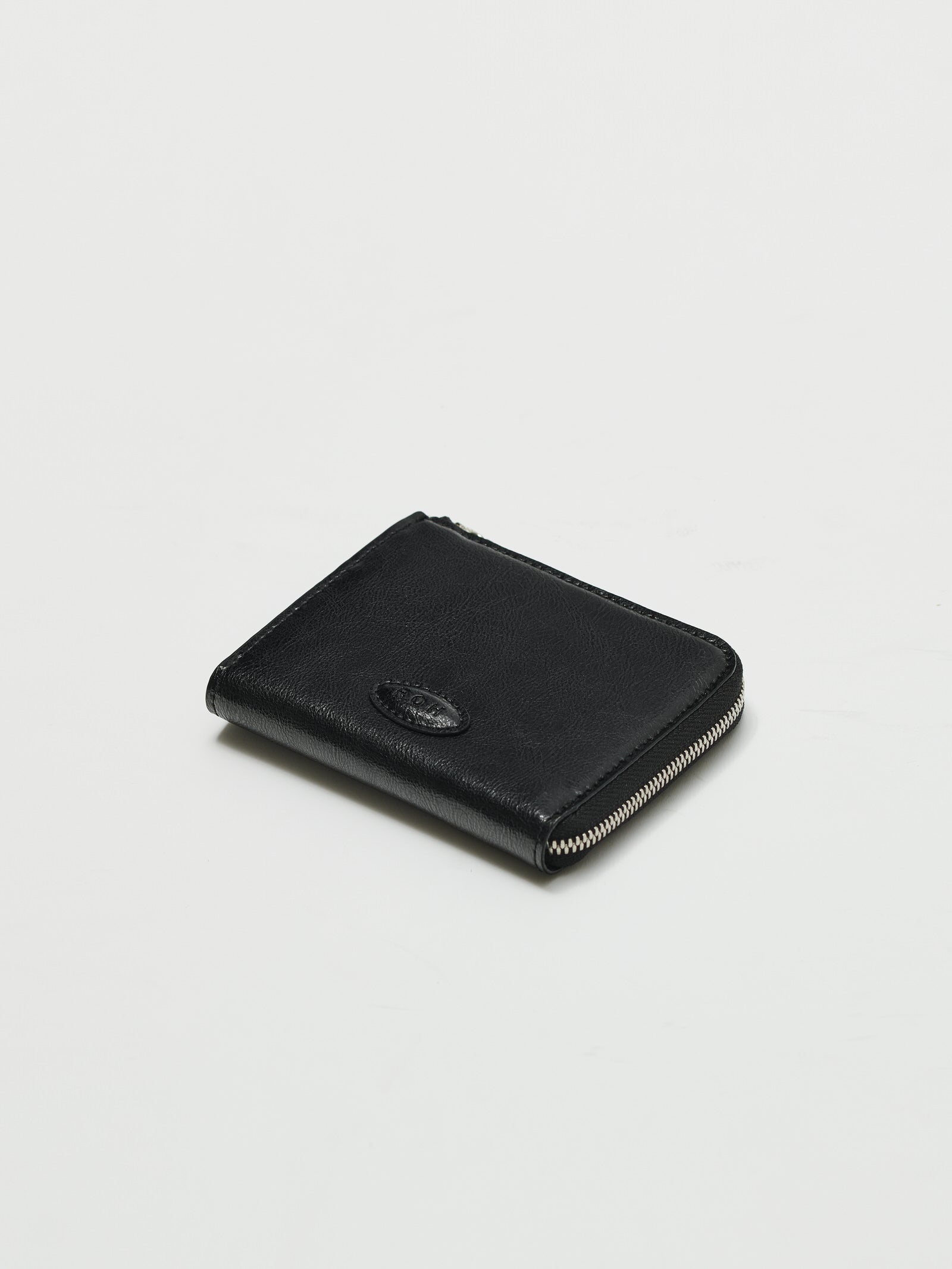 Oval button wallet